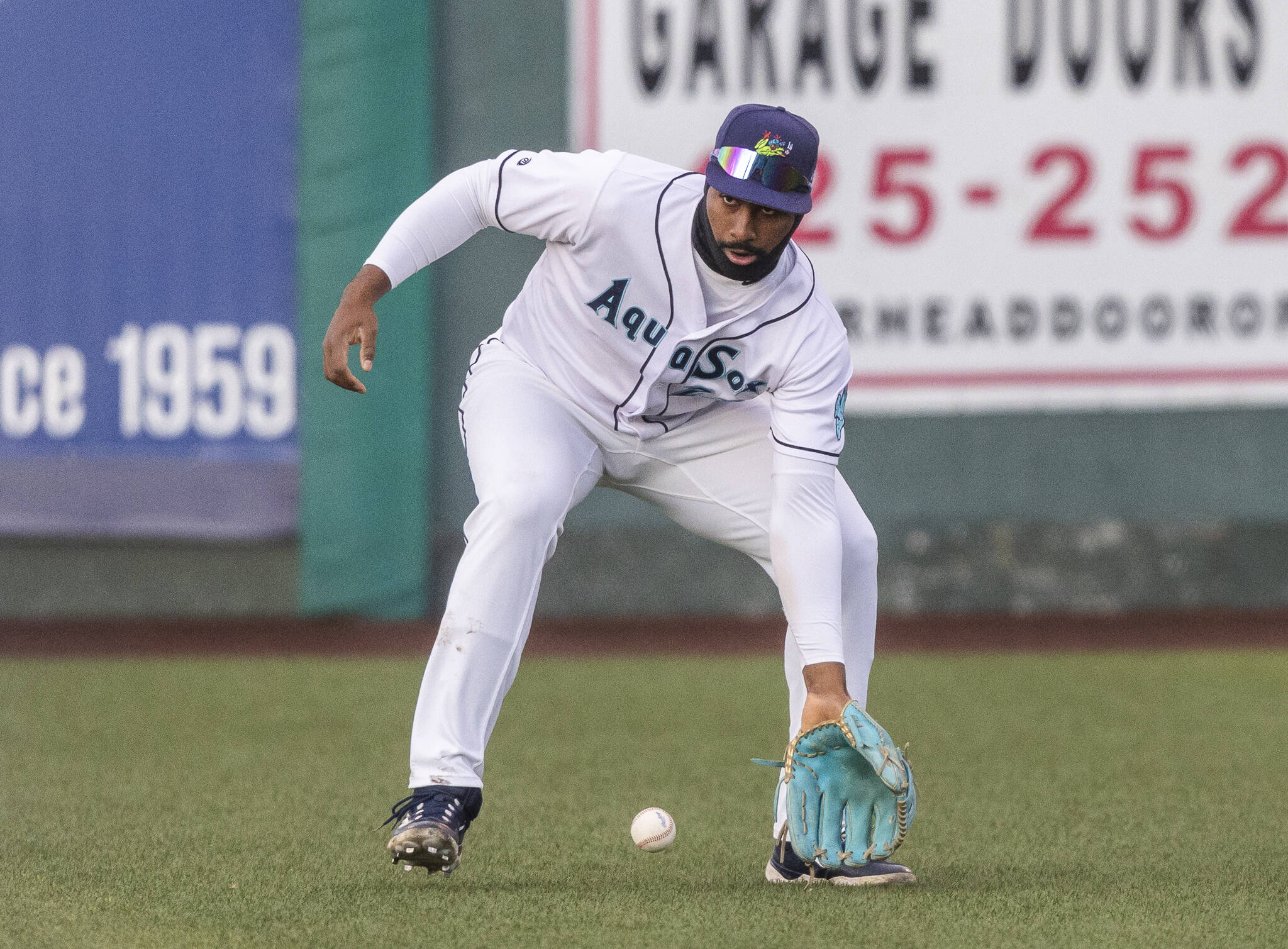 Everett AquaSox outfielder Lazaro Montes fields a ball during the Opening Day game against the Hillsboro Hops on Tuesday, April 8, 2025 in Everett, Washington. (Olivia Vanni / The Herald)