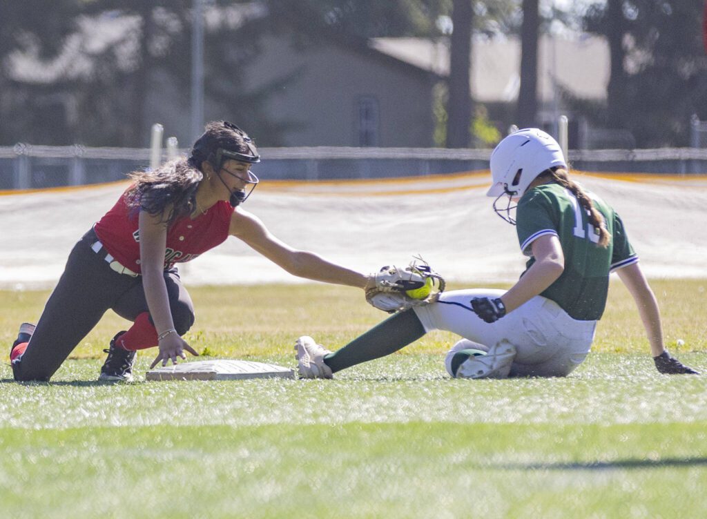 Archbishop Murphy’s Saylah Lopez tags Edmonds-Woodway’s Audrey Sommer as she slides into second base during the game on Monday, May 5, 2025 in Everett, Washington. (Olivia Vanni / The Herald)
