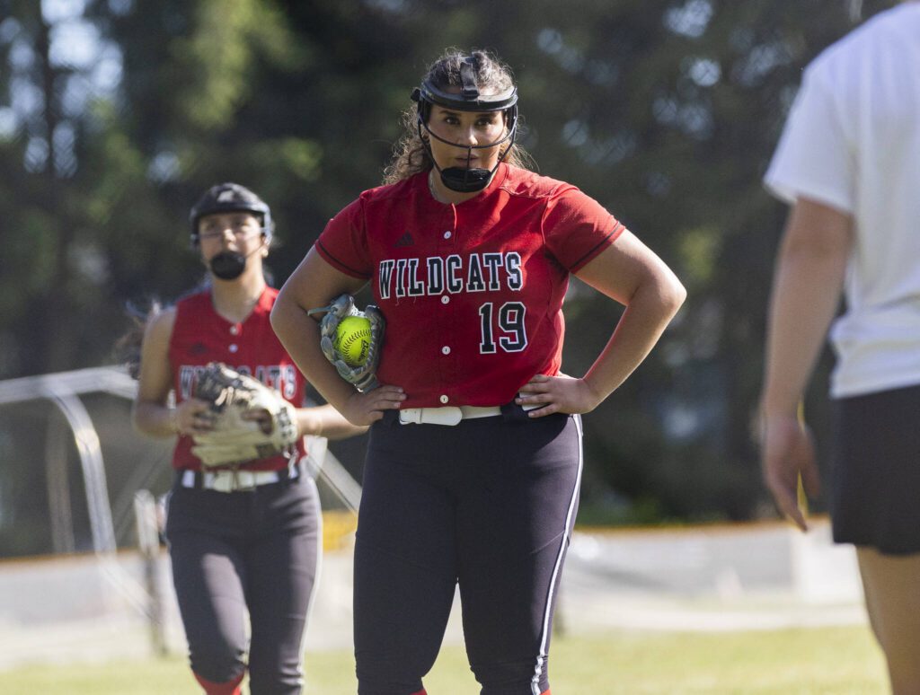 Archbishop Murphy head coach Megan Dedrick calls a time and walks out to the mound to talk with Ari Dixon during the game against Edmonds-Woodway on Monday, May 5, 2025 in Everett, Washington. (Olivia Vanni / The Herald)
