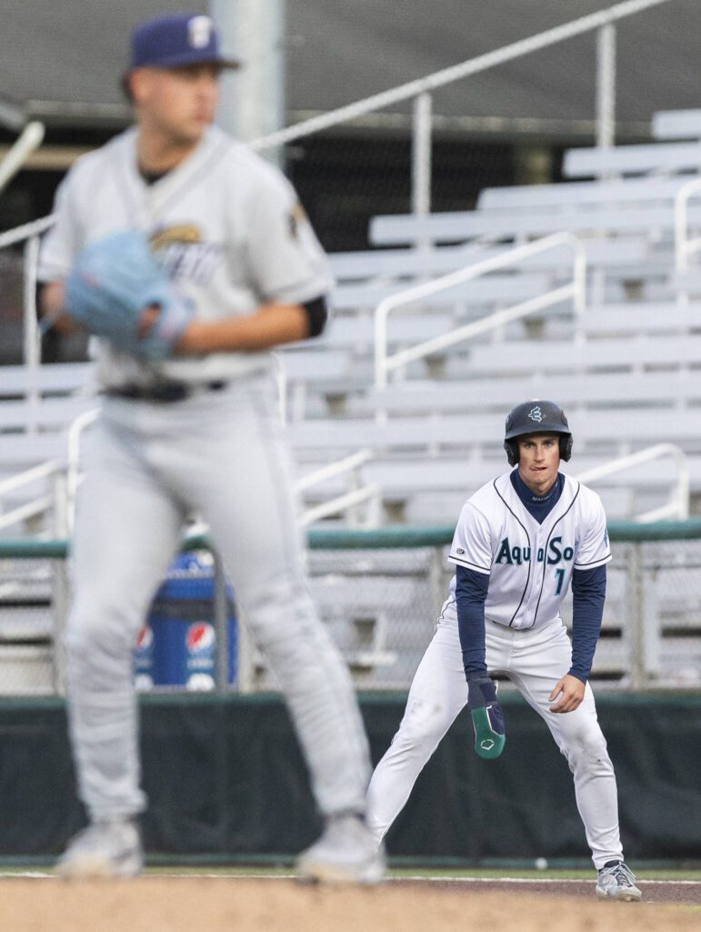 Everett AquaSox infielder Colt Emerson sticks out his tongue before running to second base during the game against the Tri-City Dust Devils on Wednesday, May 7, 2025 in Everett, Washington. (Olivia Vanni / The Herald)
