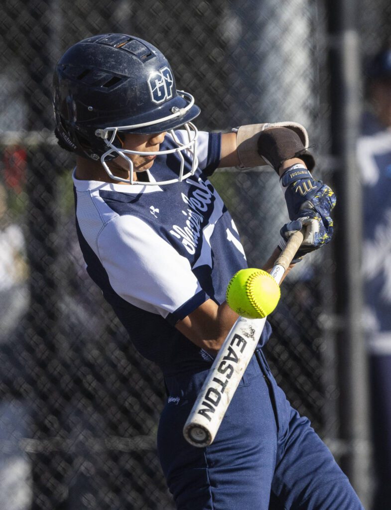 Glacier Peak’s Alexis Garcia tips the ball while at bat during the game against Issaquah on Monday, May 12, 2025 in Everett, Washington. (Olivia Vanni / The Herald)
