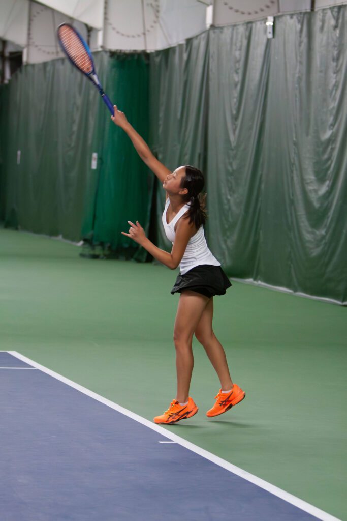 Jackson’s Jasmine Wijaya warms up before a District 1 4A playoff match on May 14, 2025 at Mill Creek Tennis Club. (Qasim Ali / The Herald)
