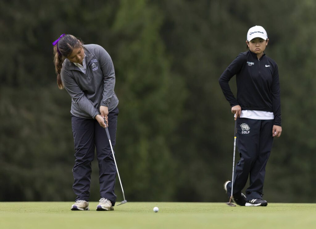 Kamiak’s Annie Jung putts during the 4A District 1 Golf Tournament at Snohomish Golf Course on Wednesday, May 14, 2025 in Snohomish, Washington. (Olivia Vanni / The Herald)
