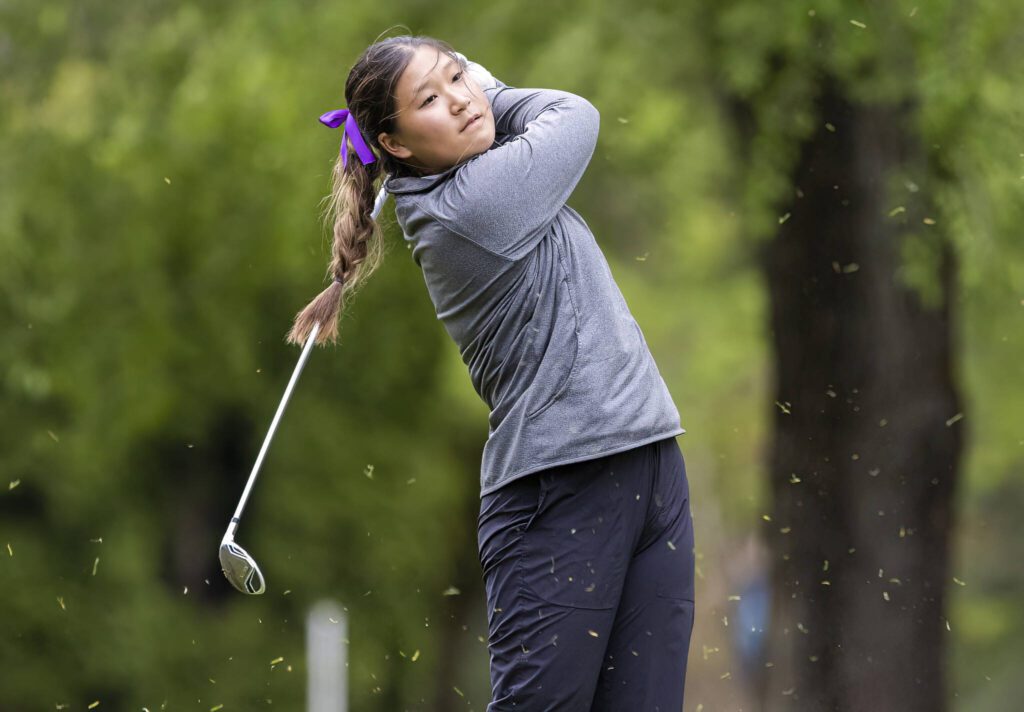 Kamiak’s Annie Jung hits a drive during the 4A District 1 Golf Tournament at Snohomish Golf Course on Wednesday, May 14, 2025 in Snohomish, Washington. (Olivia Vanni / The Herald)
