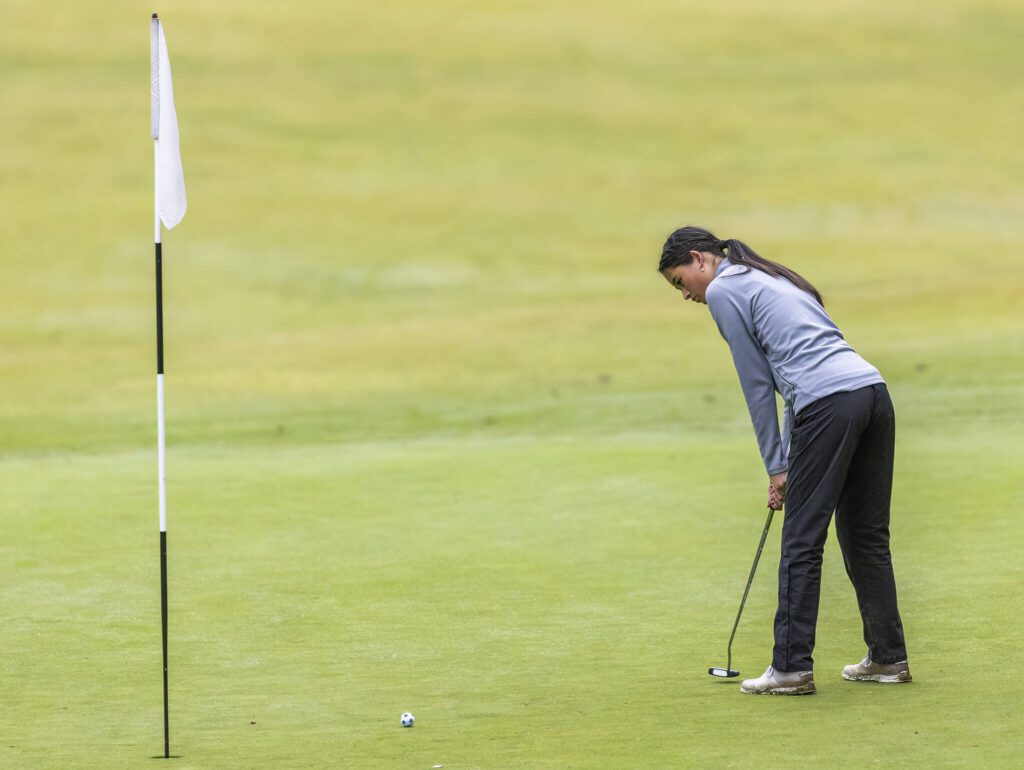 Glacier Peak’s Makayla Sarigumba putts during the 4A District 1 Golf Tournament at Snohomish Golf Course on Wednesday, May 14, 2025 in Snohomish, Washington. (Olivia Vanni / The Herald)
