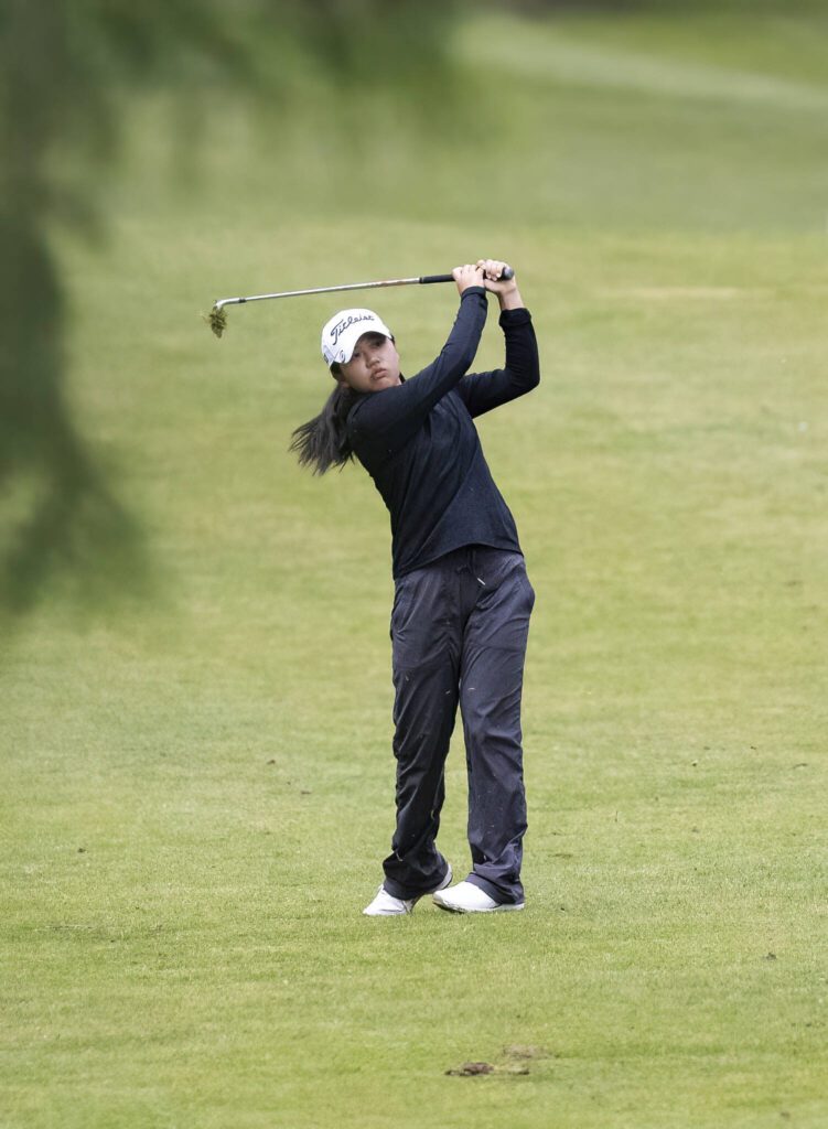 Jackson’s Chanyoung Park chips onto the green during the 4A District 1 Golf Tournament at Snohomish Golf Course on Wednesday, May 14, 2025 in Snohomish, Washington. (Olivia Vanni / The Herald)
