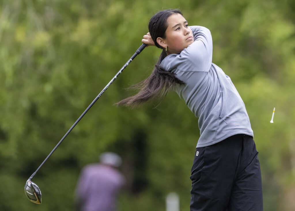 Glacier Peak’s Makayla Sarigumba hits a drive during the 4A District 1 Golf Tournament at Snohomish Golf Course on Wednesday, May 14, 2025 in Snohomish, Washington. (Olivia Vanni / The Herald)
