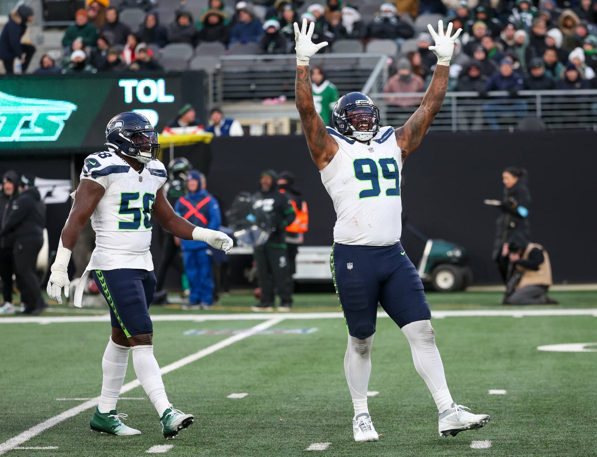 Seattle Seahawks defensive end Leonard Williams (99) reacts after sacking quarterback Aaron Rodgers Sunday, Dec. 1, 2024, in East Rutherford, N.J. (Andrew Mills / Tribune News Services)