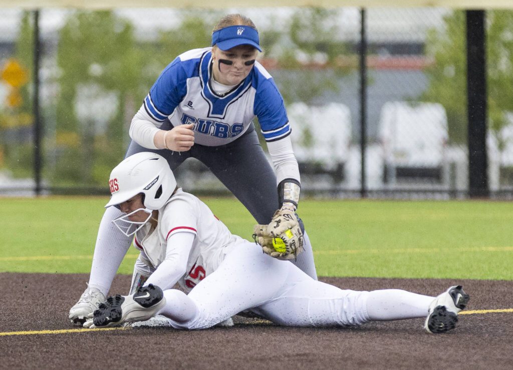 Stanwood’s Reagan Ryan slides into second base during the 3A District 1 championship game against Sedro-Woolley on Thursday, May 15, 2025 in Everett, Washington. (Olivia Vanni / The Herald)
