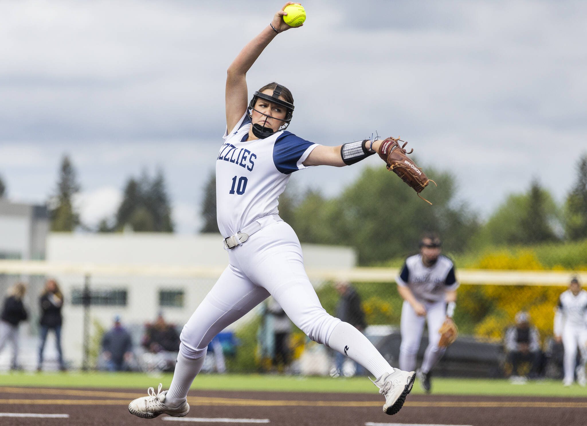Glacier Peak’s Emma Hirshorn throws a pitch during the 4A District 1 consolation game against North Creek on Friday, May 16, 2025 in Everett, Washington. (Olivia Vanni / The Herald)