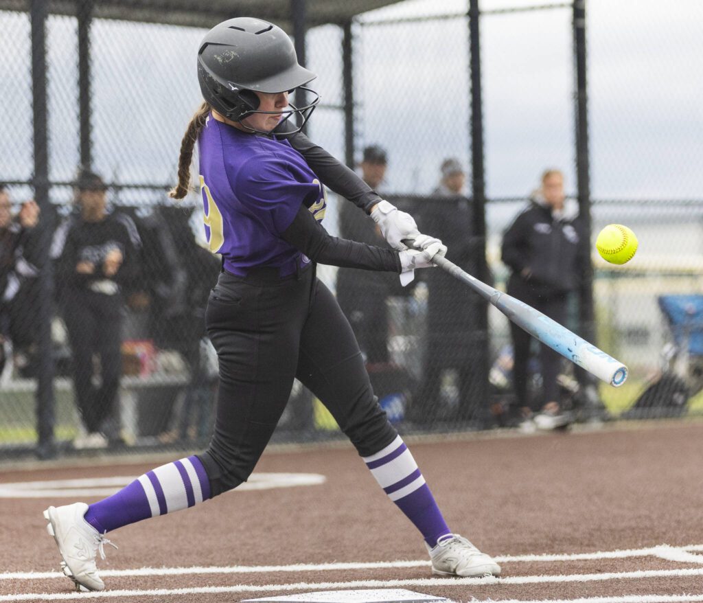 Lake Stevens’ Addison Fletcher gets a hit during the 4A District 1 game against Jackson on Friday, May 16, 2025 in Everett, Washington. (Olivia Vanni / The Herald)
