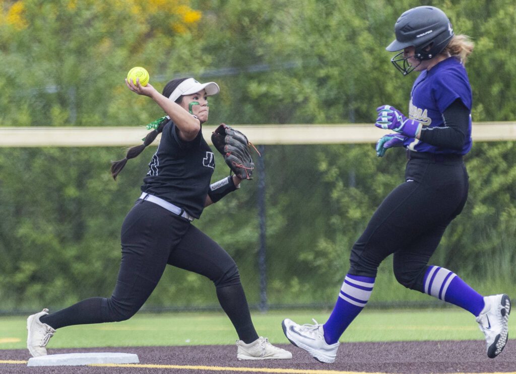 Jackson’s Matea Lopez gets a force out at second base during the 4A District 1 game against Lake Stevens on Friday, May 16, 2025 in Everett, Washington. (Olivia Vanni / The Herald)
