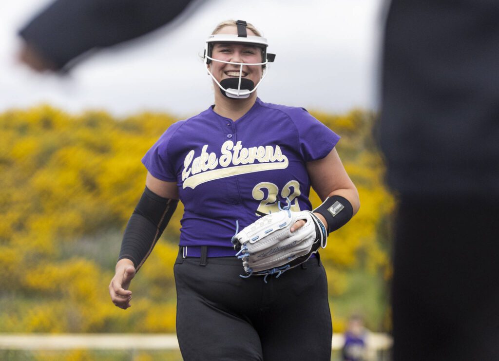 Lake Stevens’ Mara Sivley smiles after getting a strike out during the 4A District 1 game against Jackson on Friday, May 16, 2025 in Everett, Washington. (Olivia Vanni / The Herald)
