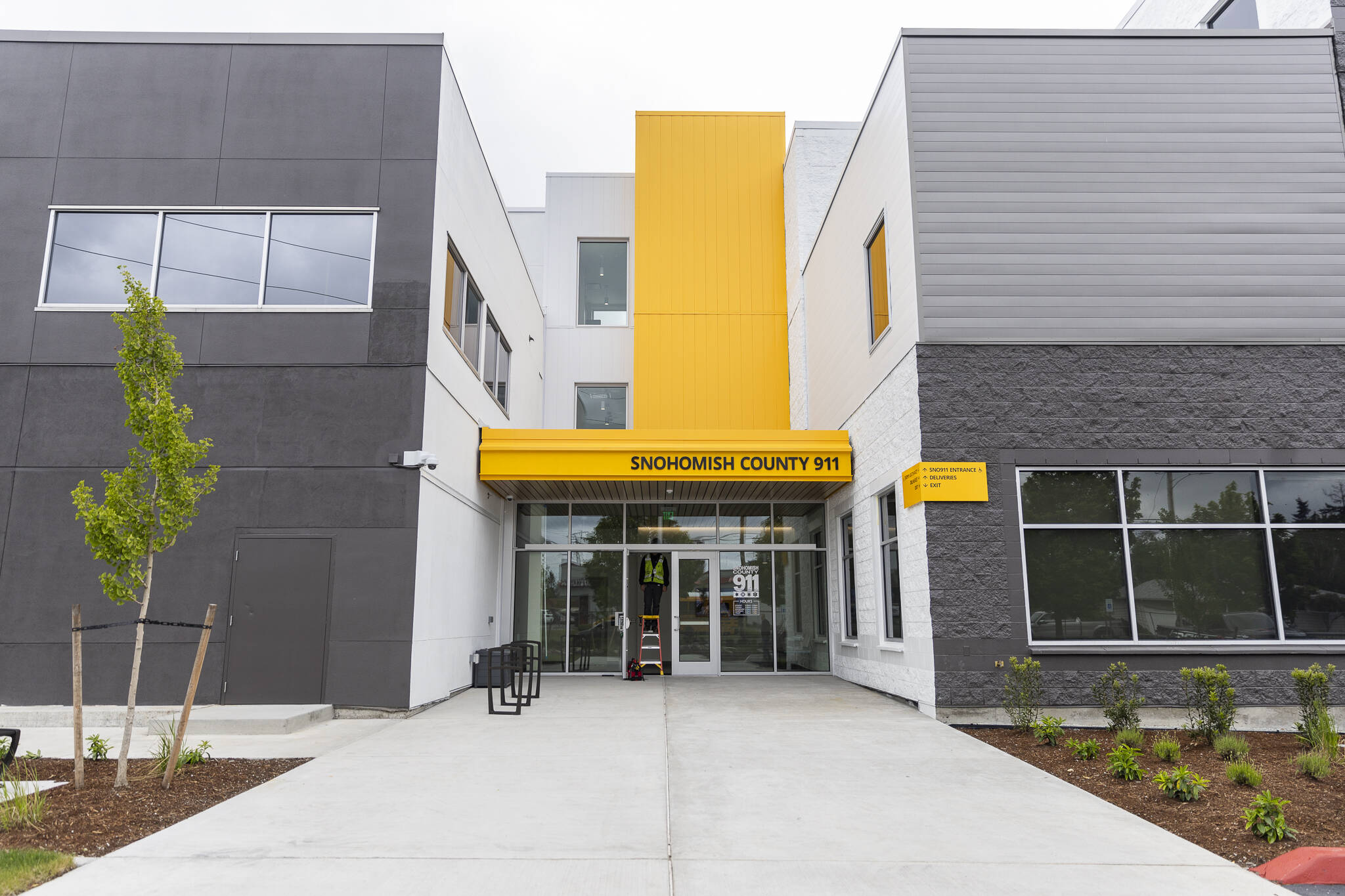 The public entrance of the new Snohomish County 911 building along Evergreen Mall Way on Tuesday, May 20, 2025, in Everett, Washington. (Olivia Vanni / The Herald)