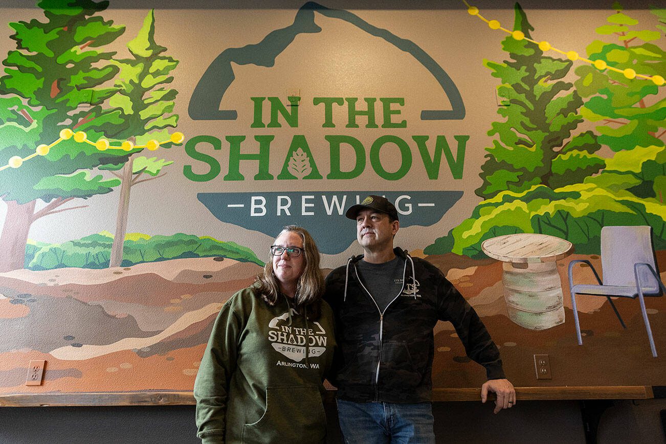 Sarah and Cole Rinehardt, owners of In The Shadow Brewing, on Wednesday, March 12, 2025 in Arlington, Washington. (Olivia Vanni / The Herald)