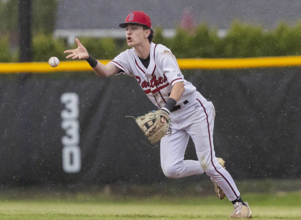Snohomish’s Griffin Triggs tosses the ball to Chase Clark at second base to get the final out during the opening round 3A state game against Bellevue on Tuesday, May 20, 2025 in Snohomish, Washington. (Olivia Vanni / The Herald)
