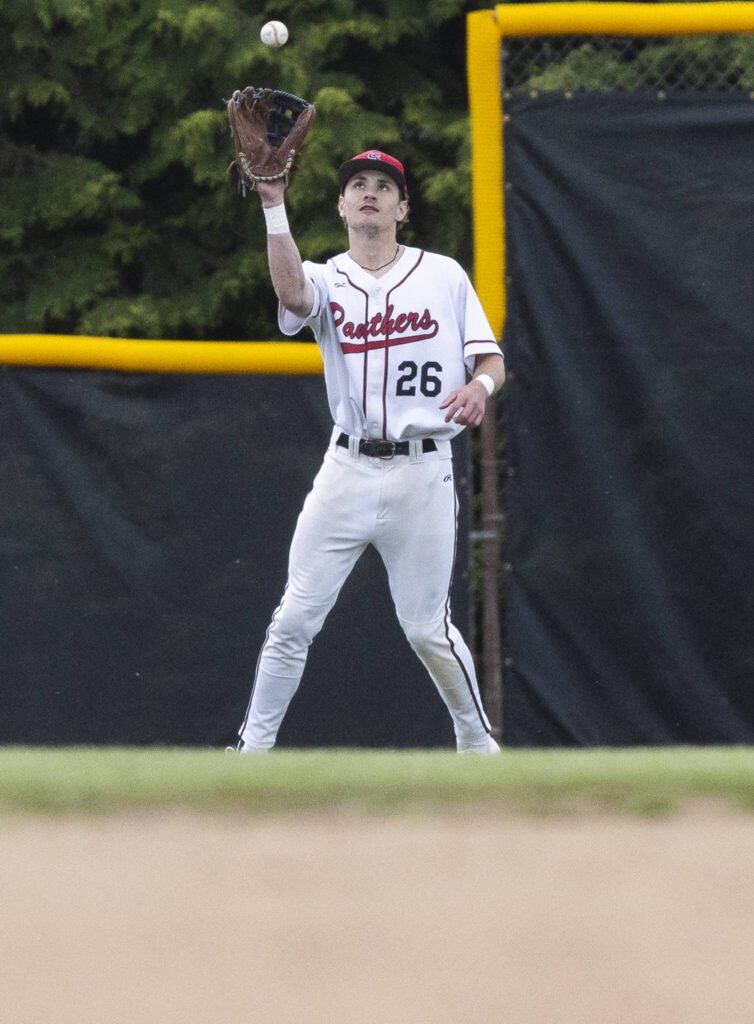 Snohomish’s Dylan Hutchinson makes a catch in the outfield during the opening round 3A state game against Bellevue on Tuesday, May 20, 2025 in Snohomish, Washington. (Olivia Vanni / The Herald)
