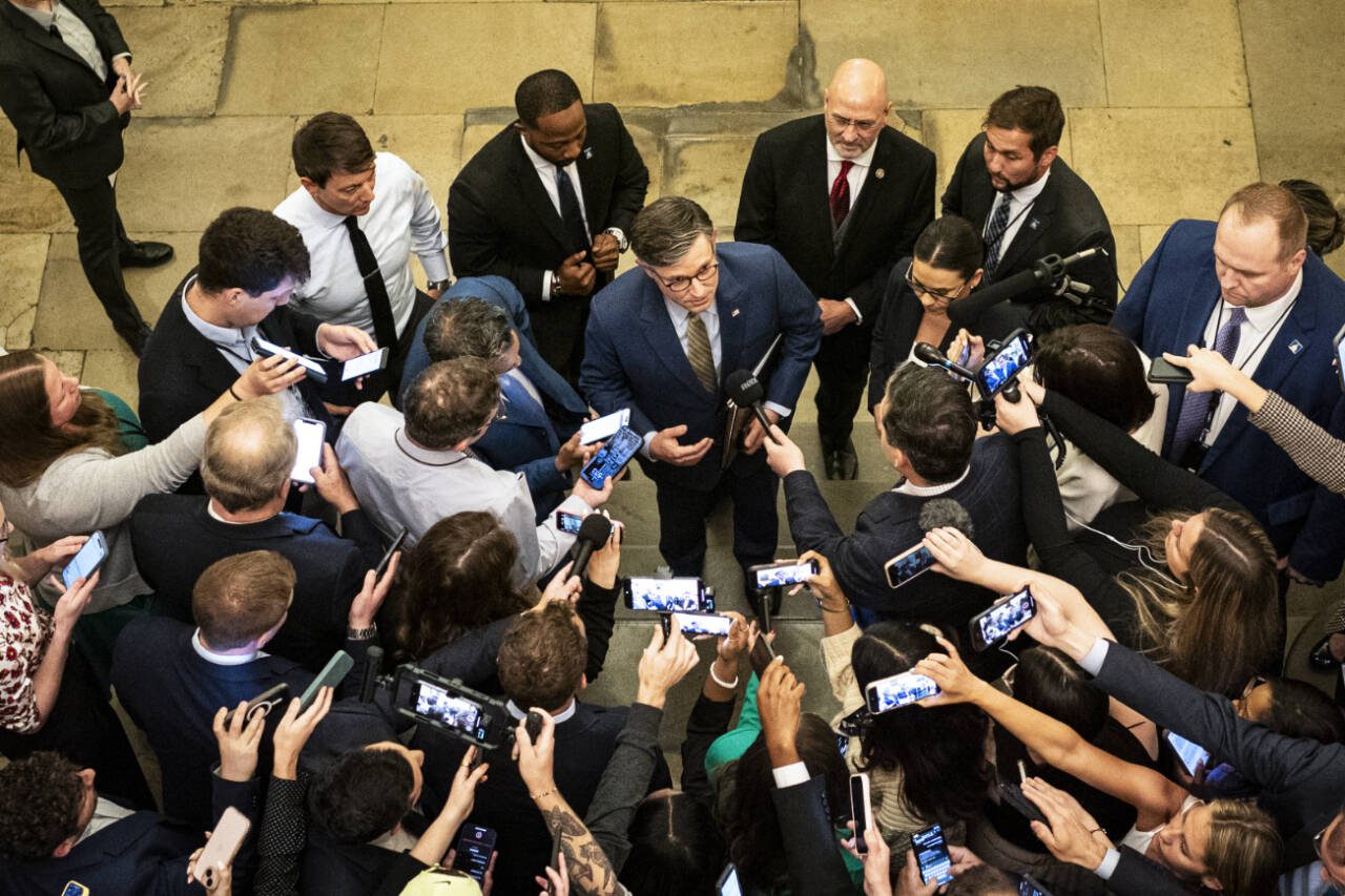 House Speaker Mike Johnson, R-La., speaks to reporters after returning from a meeting at the White House on Capitol Hill in Washington, on May 21. (Haiyun Jiang / The New York Times)