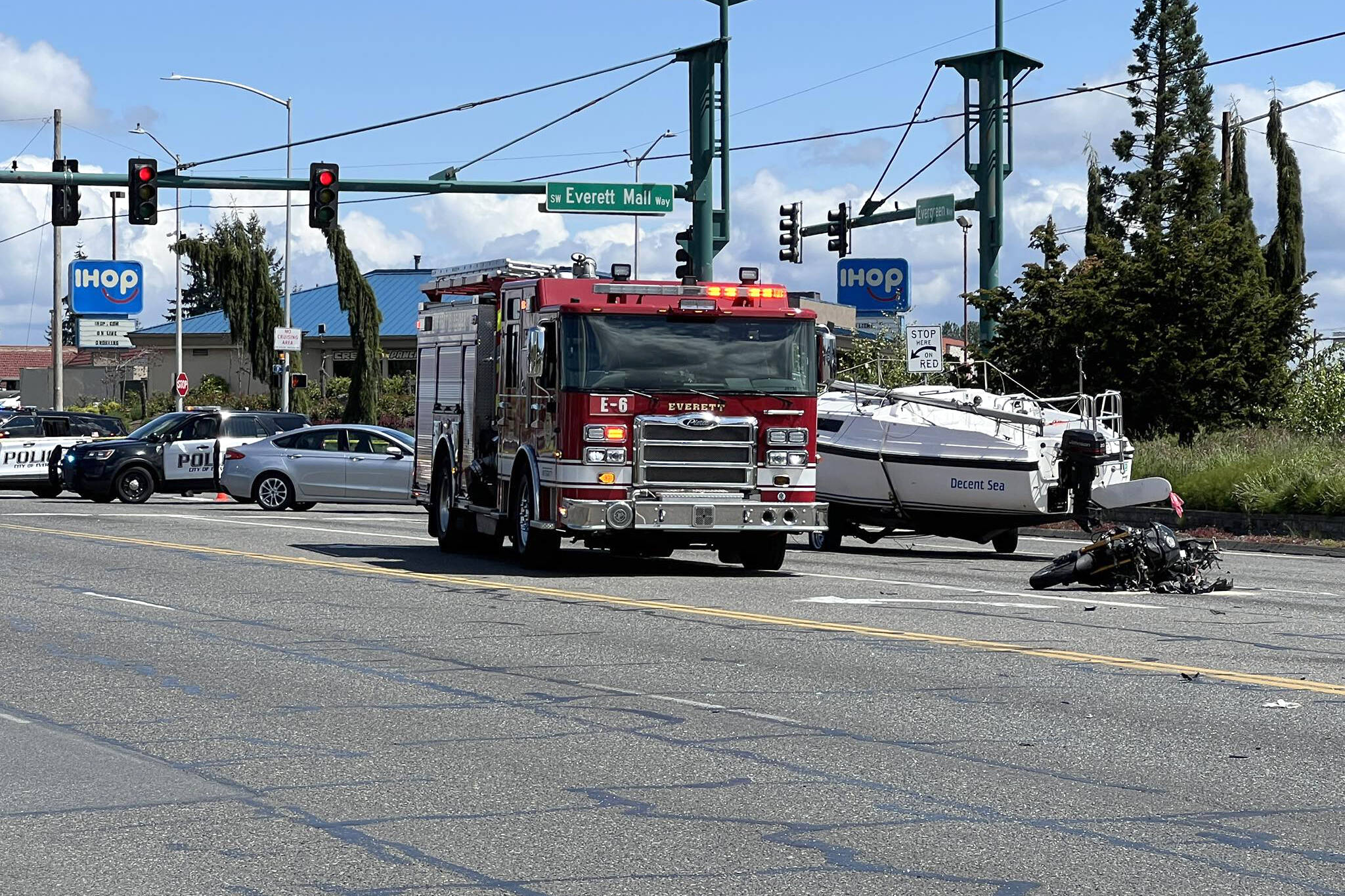 A fatal collision involving two vehicles and a motorcycle shut down Evergreen Way for several hours on Thursday afternoon. (Everett Fire Department)