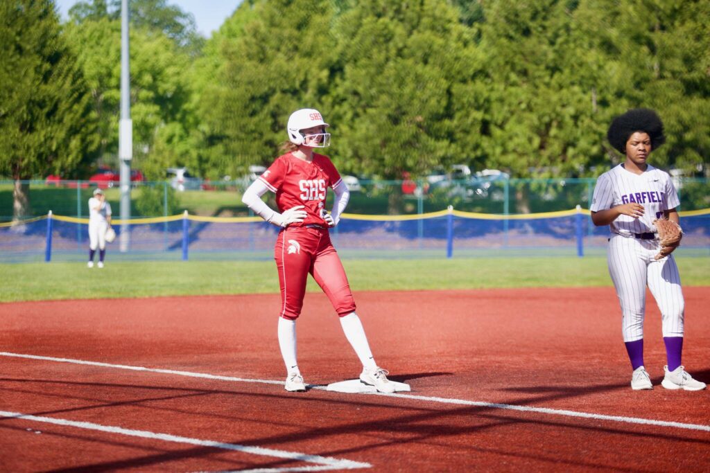 Stanwood senior Reagan Ryan stands at third base during the Spartans’ 5-4 loss to Garfield in the 3A State Softball quarterfinals in Lacey, Washington on May 23, 2025. (Joe Pohoryles / The Herald)
