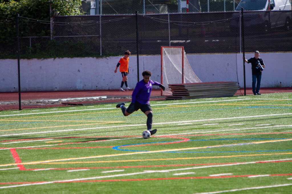 Edmonds-Woodway keeper Daniel Abraham launches a goal kick during a 3A State second-round game against Monroe on May 23, 2025 at Mercer Island High School. (Qasim Ali / The Herald)

