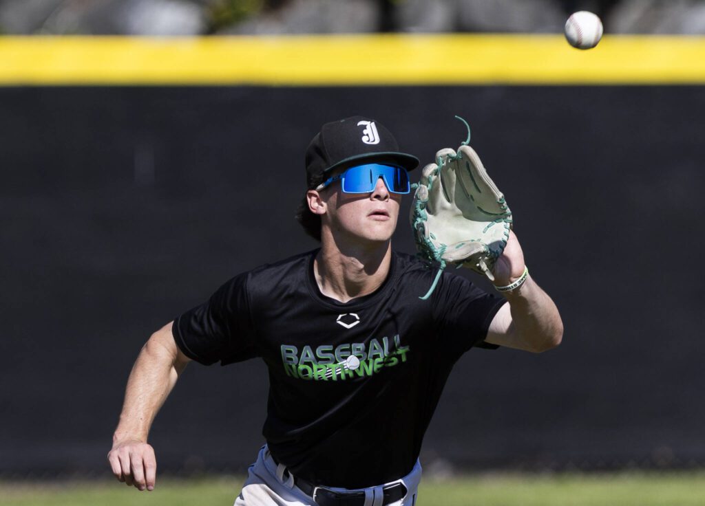 Jackson’s Quin Johns makes a catch during an outfielder drill during practice on Wednesday, May 28, 2025 in Mill Creek, Washington. (Olivia Vanni / The Herald)

