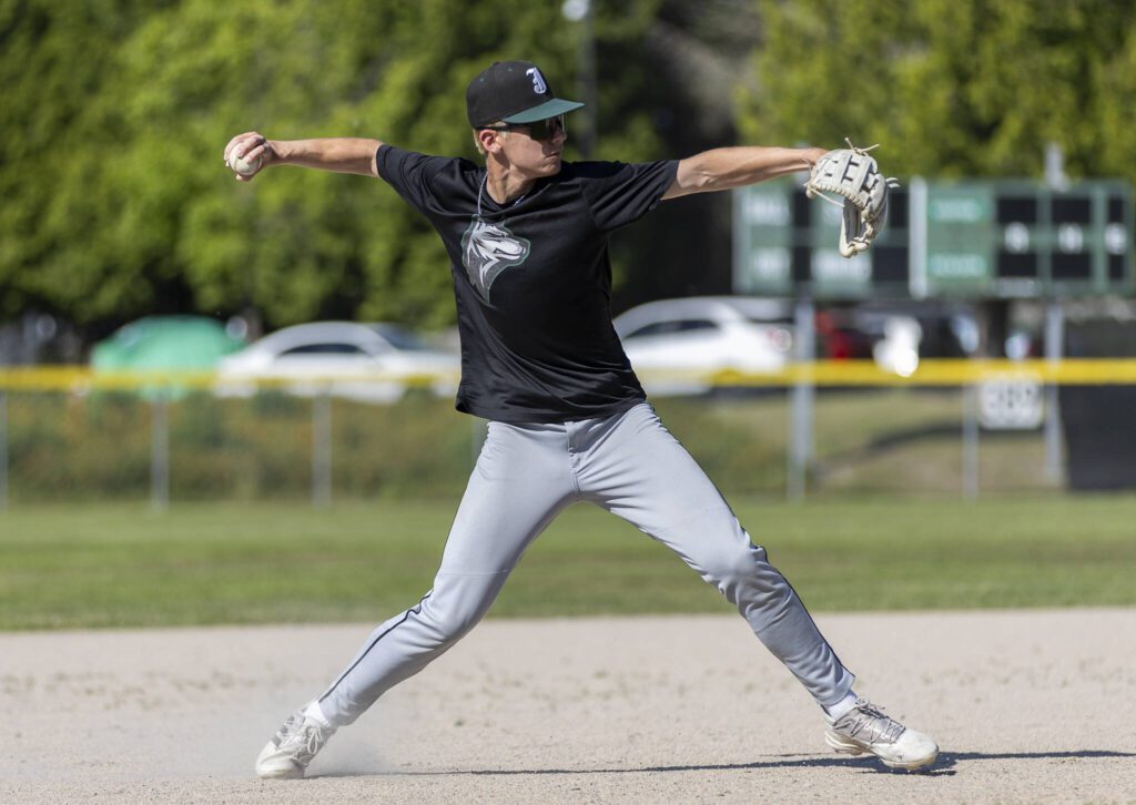 Jackson’s Lucas Poindexter makes a throw from third base during practice on Wednesday, May 28, 2025 in Mill Creek, Washington. (Olivia Vanni / The Herald)
