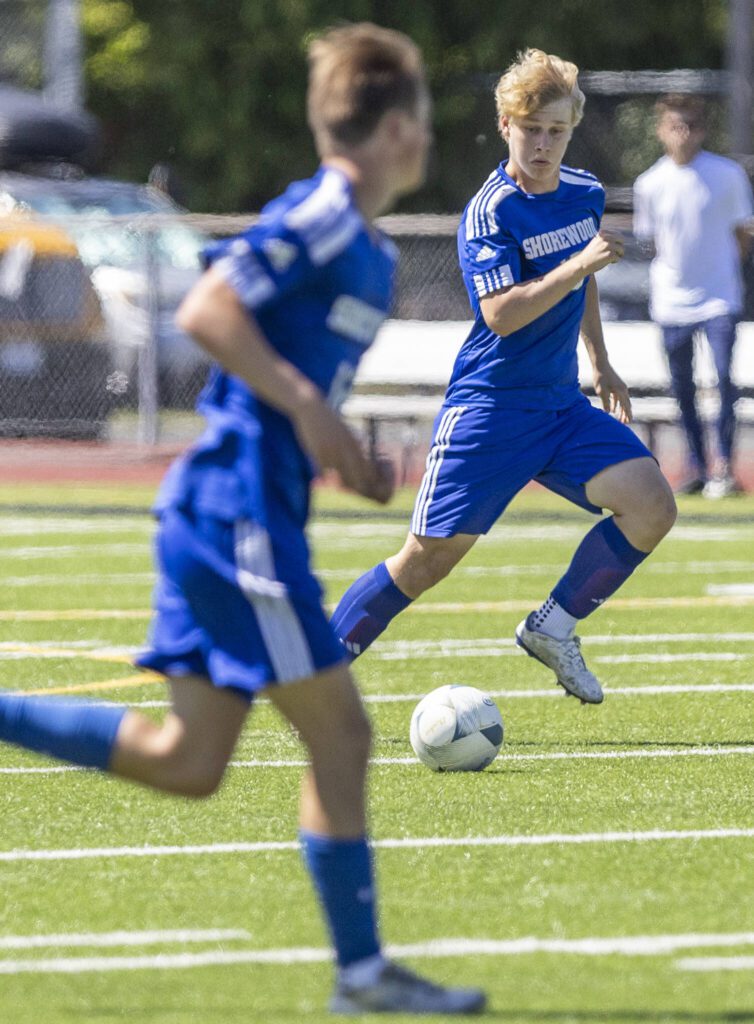 Shorewood’s Morgan Grutz dribbles the ball down the field during the 3A state semifinal game against Ingraham on Friday, May 30, 2025 in Puyallup, Washington. (Olivia Vanni / The Herald)
