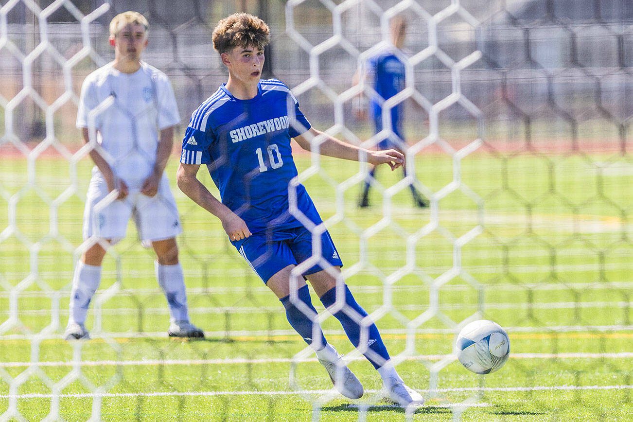 Shorewood’s Niki Genadiev takes a penalty kick during the 3A state semifinal game against Ingraham on Friday, May 30, 2025 in Puyallup, Washington. (Olivia Vanni / The Herald)