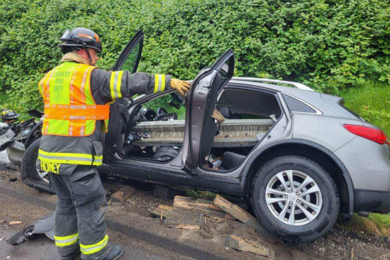 A guardrail pierced through a car during a crash early Monday on I-5. (Everett Fire)