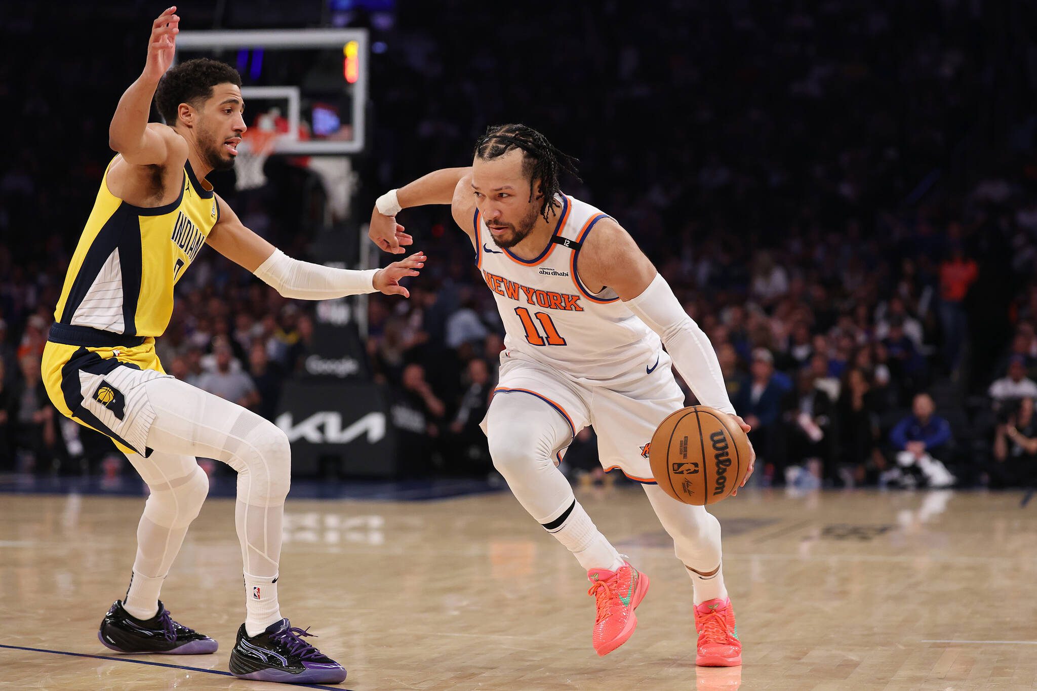 The New York Knicks' Jalen Brunson (11) drives against the Indiana Pacers' Tyrese Haliburton (0) during the third quarter in Game Five of the Eastern Conference finals at Madison Square Garden on Thursday, May 29, 2025, in New York. (Al Bello / Getty Images / Tribune News Services)