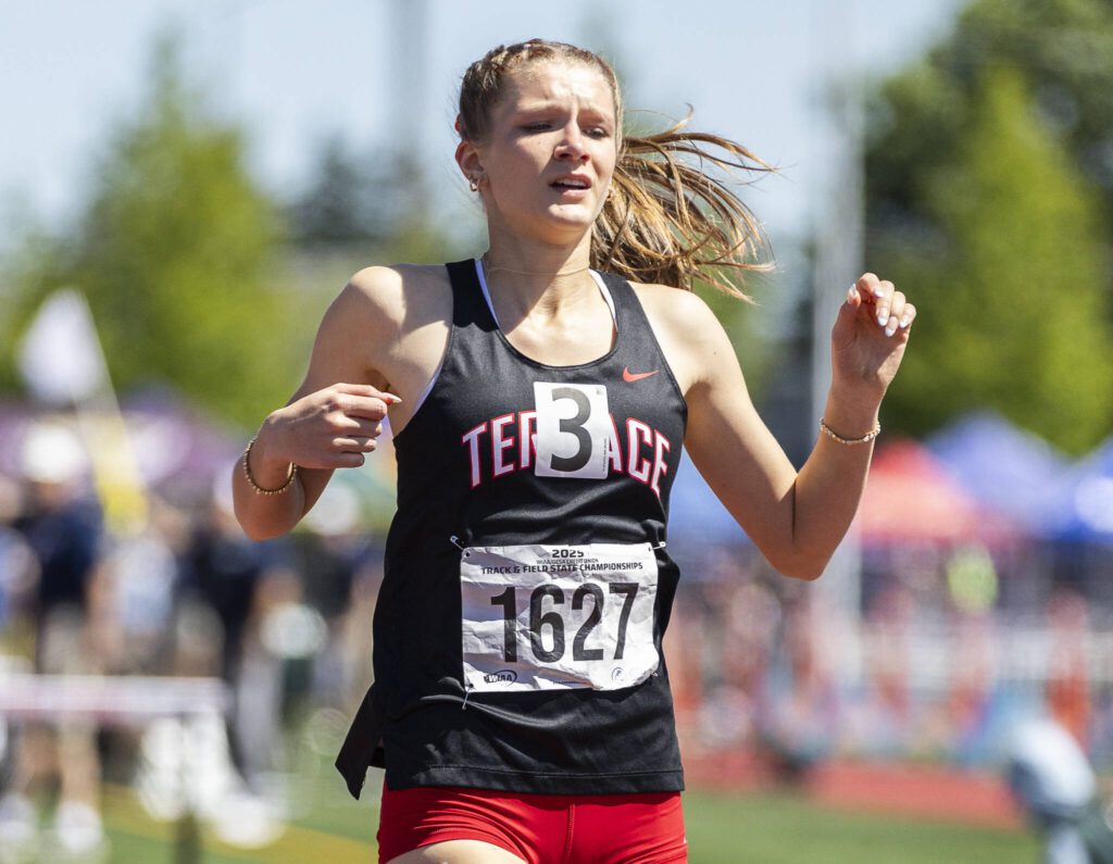 Mountlake Terrace’s Brynlee Dubiel runs past the finish line after getting third place in the 3A Girls 110 Hurdles final on Friday, May 30, 2025 in Tacoma, Washington. (Olivia Vanni / The Herald)
