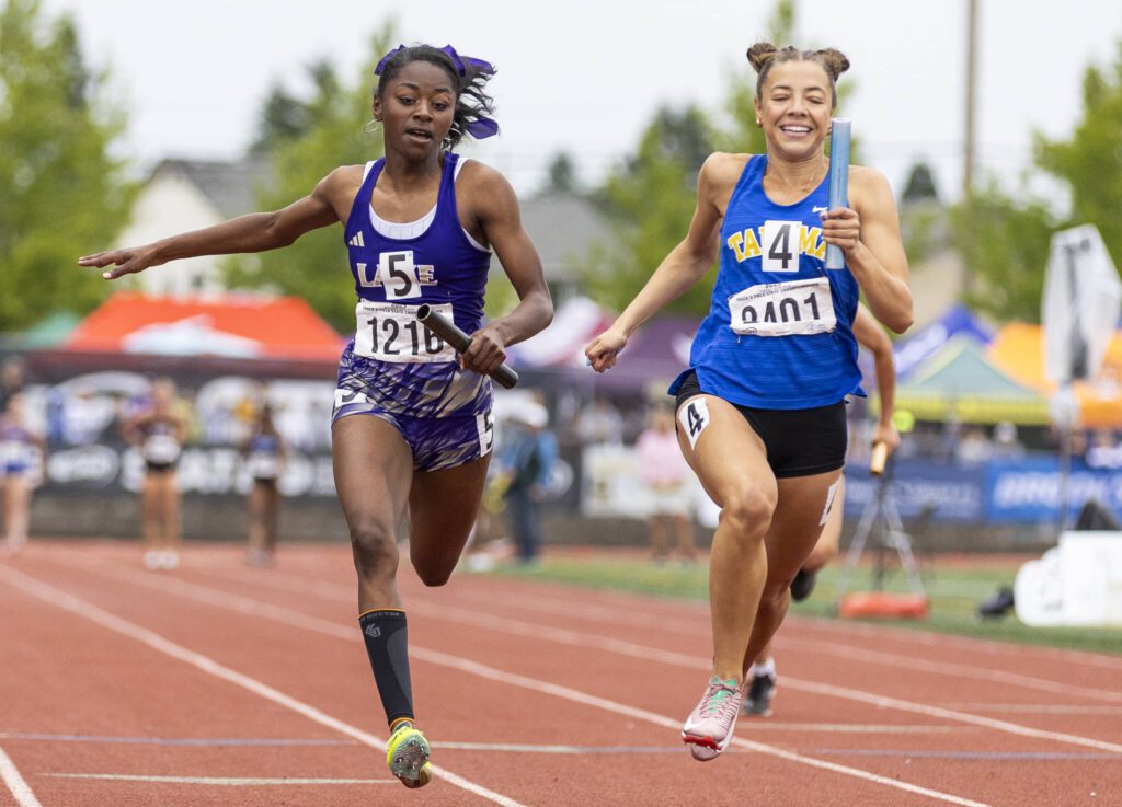 Lake Stevens’ Brianna Tilgham crosses the finish line in the 4A girls 4×100 relay final on Saturday, May 31, 2025 in Tacoma, Washington. (Olivia Vanni / The Herald)
