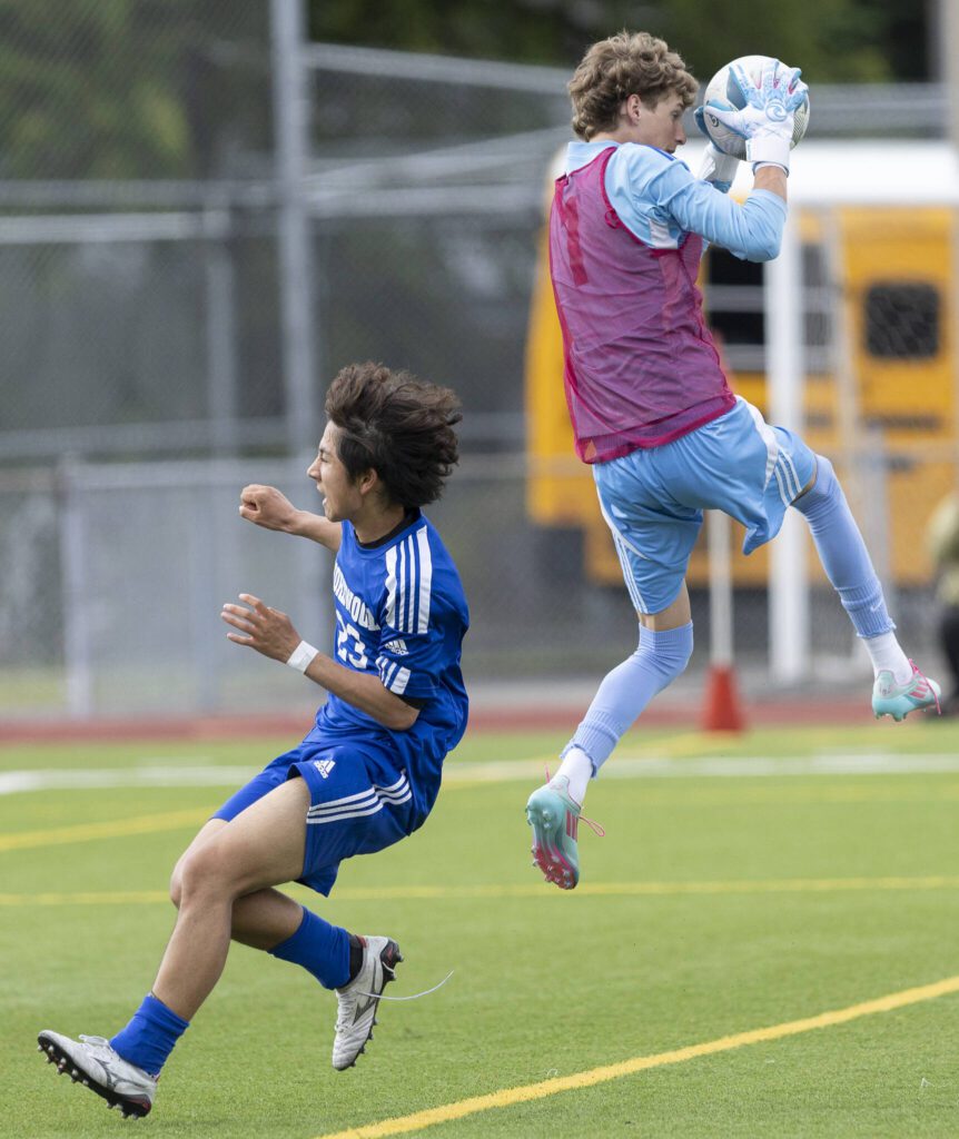 Shorewood’s Ian Baxter runs past Mercer Island’s goal keeper during the 3A state championship game on Saturday, May 31, 2025 in Puyallup, Washington. (Olivia Vanni / The Herald)
