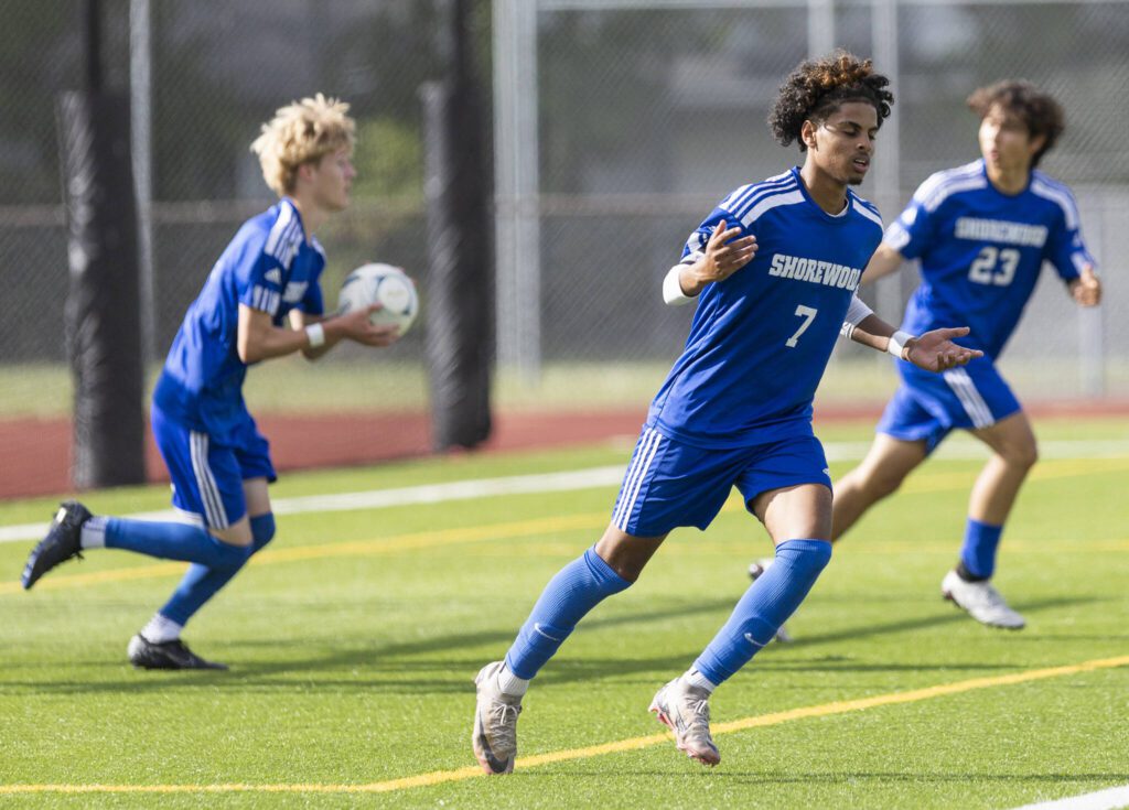 Shorewood’s Matthew Bereket lifts his arms up after scoring a goal during the 3A state championship game against Mercer Island on Saturday, May 31, 2025 in Puyallup, Washington. (Olivia Vanni / The Herald)
