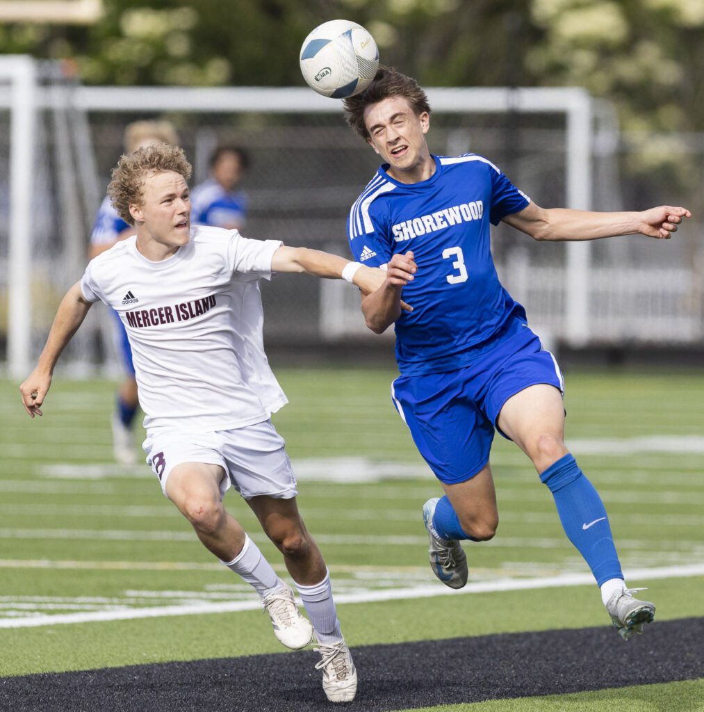 Shorewood’s Tally Lord heads the ball to keep it in play during the 3A state championship game against Mercer Island on Saturday, May 31, 2025 in Puyallup, Washington. (Olivia Vanni / The Herald)
