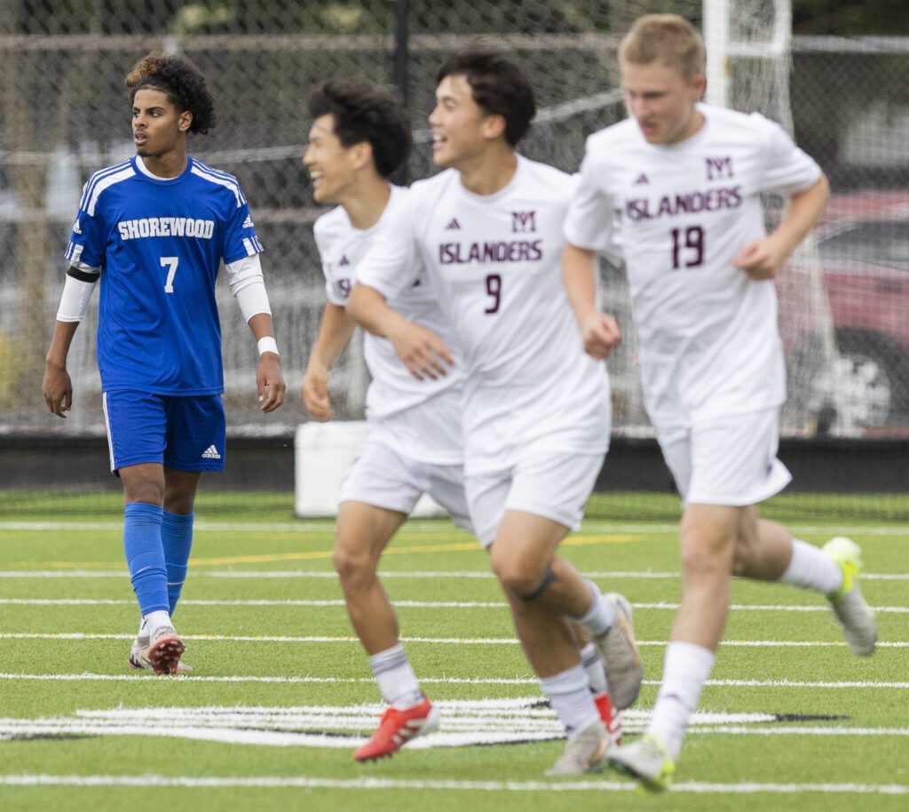 Shorewood’s Matthew Bereket looks on as Mercer Island players celebrate after scoring during the 3A state championship game on Saturday, May 31, 2025 in Puyallup, Washington. (Olivia Vanni / The Herald)

