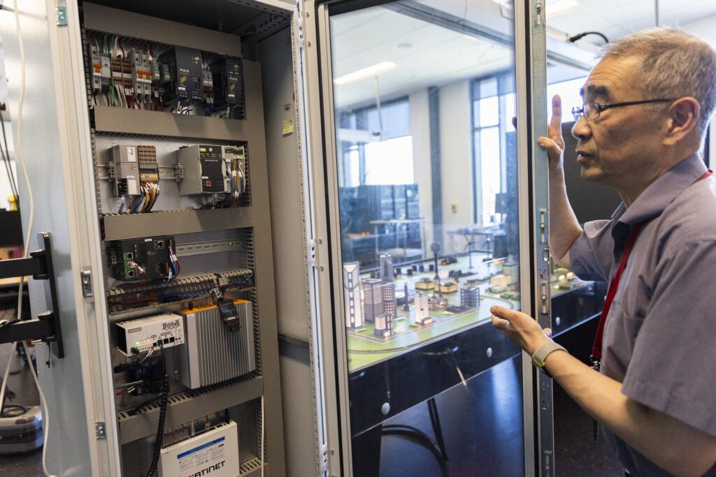 Cybersecurity Professor Shih-Lien (Linus) Lu talks about the technology the students work with on Wednesday, May 28, 2025 in Everett, Washington. (Olivia Vanni / The Herald)

