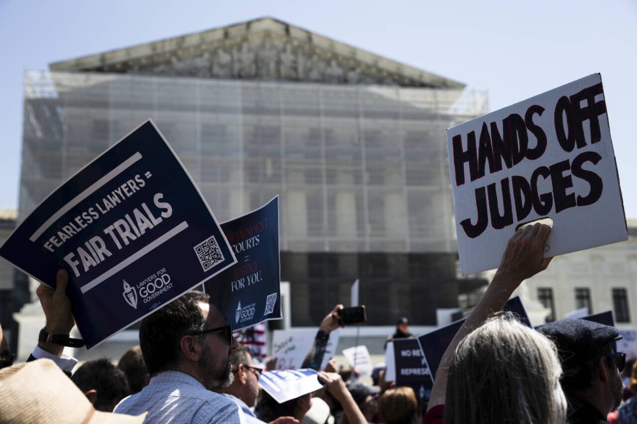 Demonstrators gather as part of the National Law Day of Action outside the Supreme Court in Washington, D.C., May 1. (Tierney L. Cross / The New York Times)