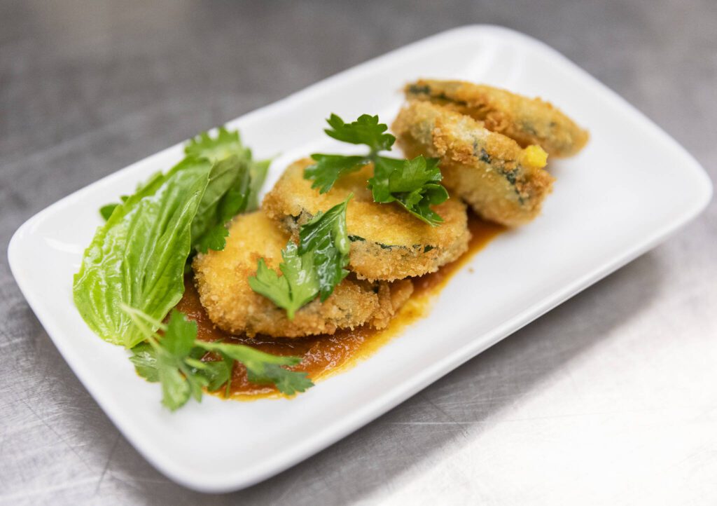 An appetizer of fried zucchini with tomato sauce, parmesan and basil at the Edmonds College Cafe on Thursday, May 29, 2025 in Lynnwood, Washington. (Olivia Vanni / The Herald)
