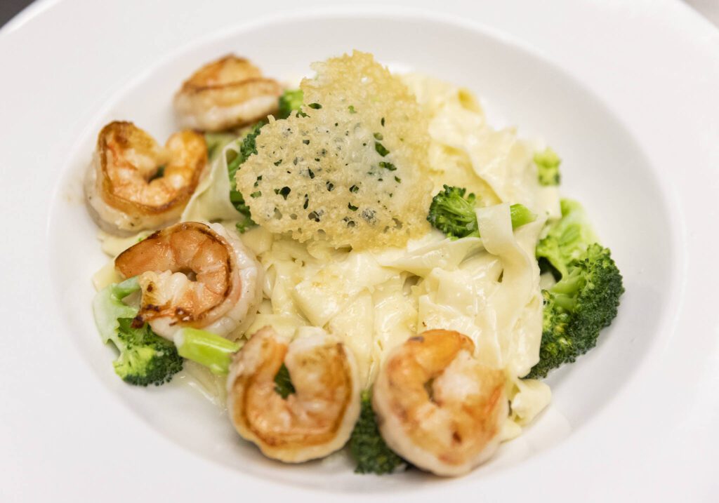 Fettuccine Alfredo with sauce shrimp and broccoli at the Edmonds College Cafe on Thursday, May 29, 2025 in Lynnwood, Washington. (Olivia Vanni / The Herald)
