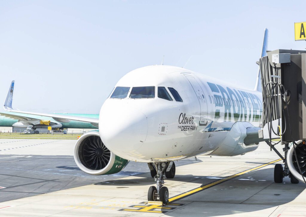 Frontier Airlines’ first flight arrives at the gate at Paine Field Airport on Monday, June 2, 2025 in Everett, Washington. (Olivia Vanni / The Herald)

