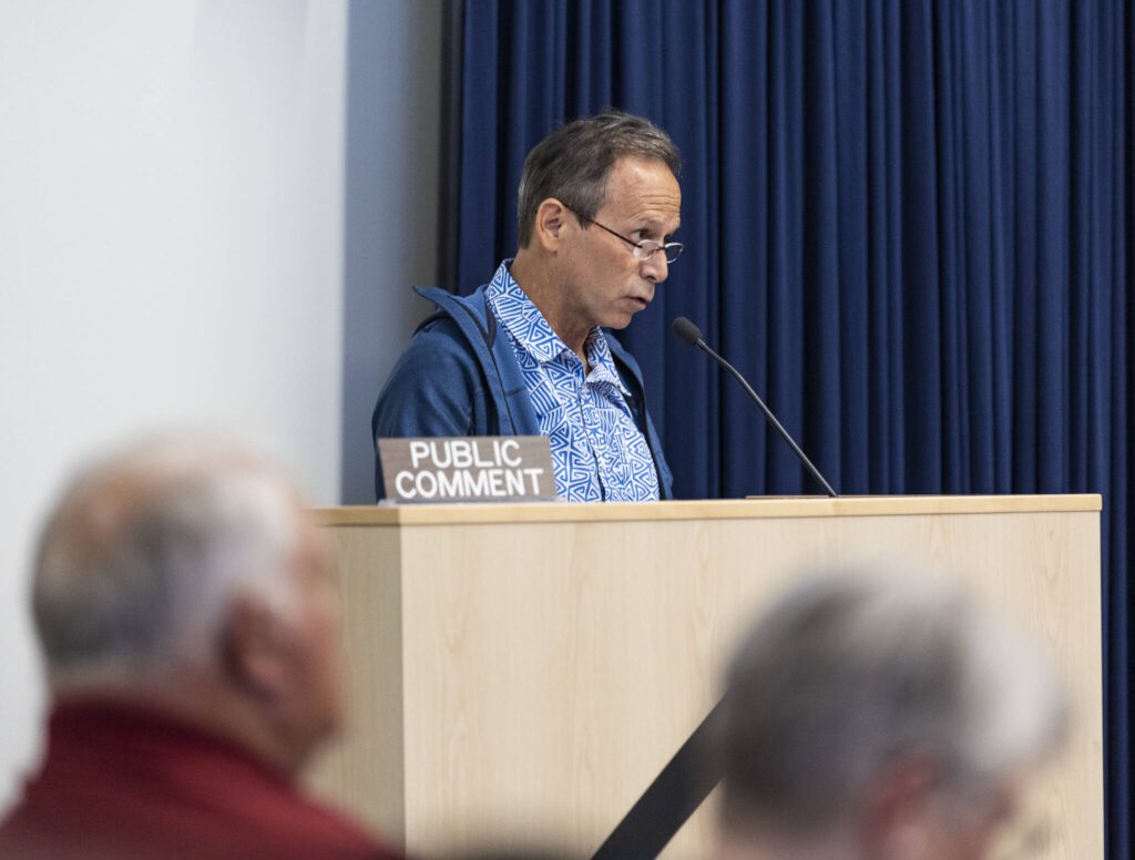 Alvaro Guillen speaks in opposition of installing the Flock Safety license plate camera system on Thursday, June 5, 2025, in Mountlake Terrace, Washington. (Olivia Vanni / The Herald)
