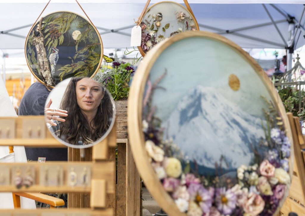 Cherish Dahinden, owner of Wild Flowear, talks about some of her work during Sorticulture on Friday, June 6, 2025 in Everett, Washington. (Olivia Vanni / The Herald)
