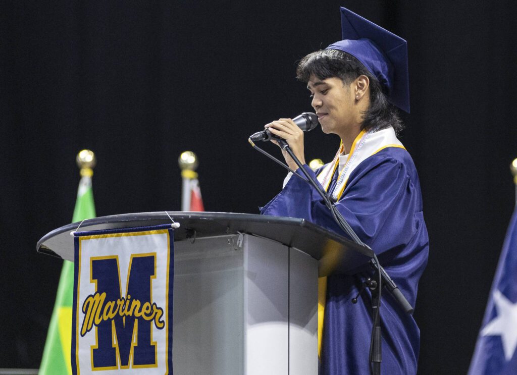 Class speaker Maximus Trias smiles as he delivers his speech during Mariner High School’s 2025 commencement on Friday, June 13, 2025, at Angel of the Winds Arena in Everett, Washington. (Olivia Vanni / The Herald)

