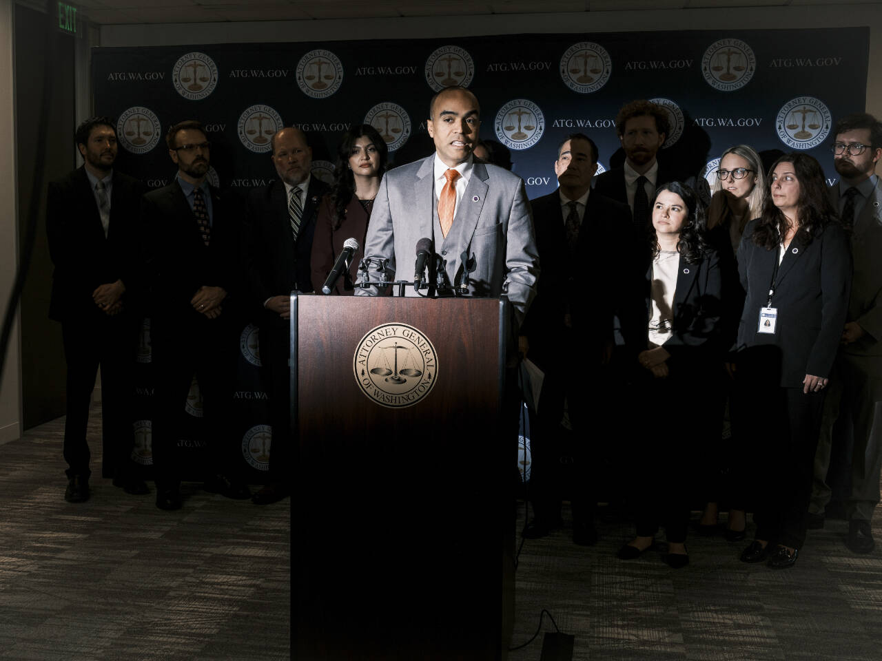 Washington state Attorney General Nick Brown speaks with reporters during a press conference in Seattle, on April 4. Brown had filed a lawsuit accusing the Adams County sheriff of sharing inmate information with federal immigration agents in defiance of a state law meant to limit collaboration between state law enforcement officers and federal immigration agencies. (Jordan Gale / The New York Times)