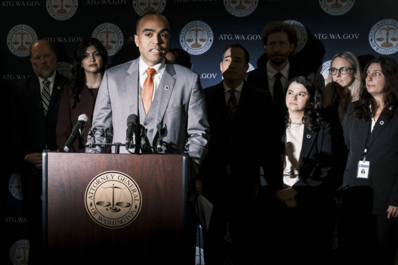 Washington State Attorney General Nick Brown, speaks with reporters during a press conference in Seattle, on April 4, 2025. Brown has filed a lawsuit accusing the Adams County sheriff of sharing inmate information with federal immigration agents in defiance of a state law meant to limit collaboration between state law enforcement officers and federal immigration agencies. (Jordan Gale/The New York Times)