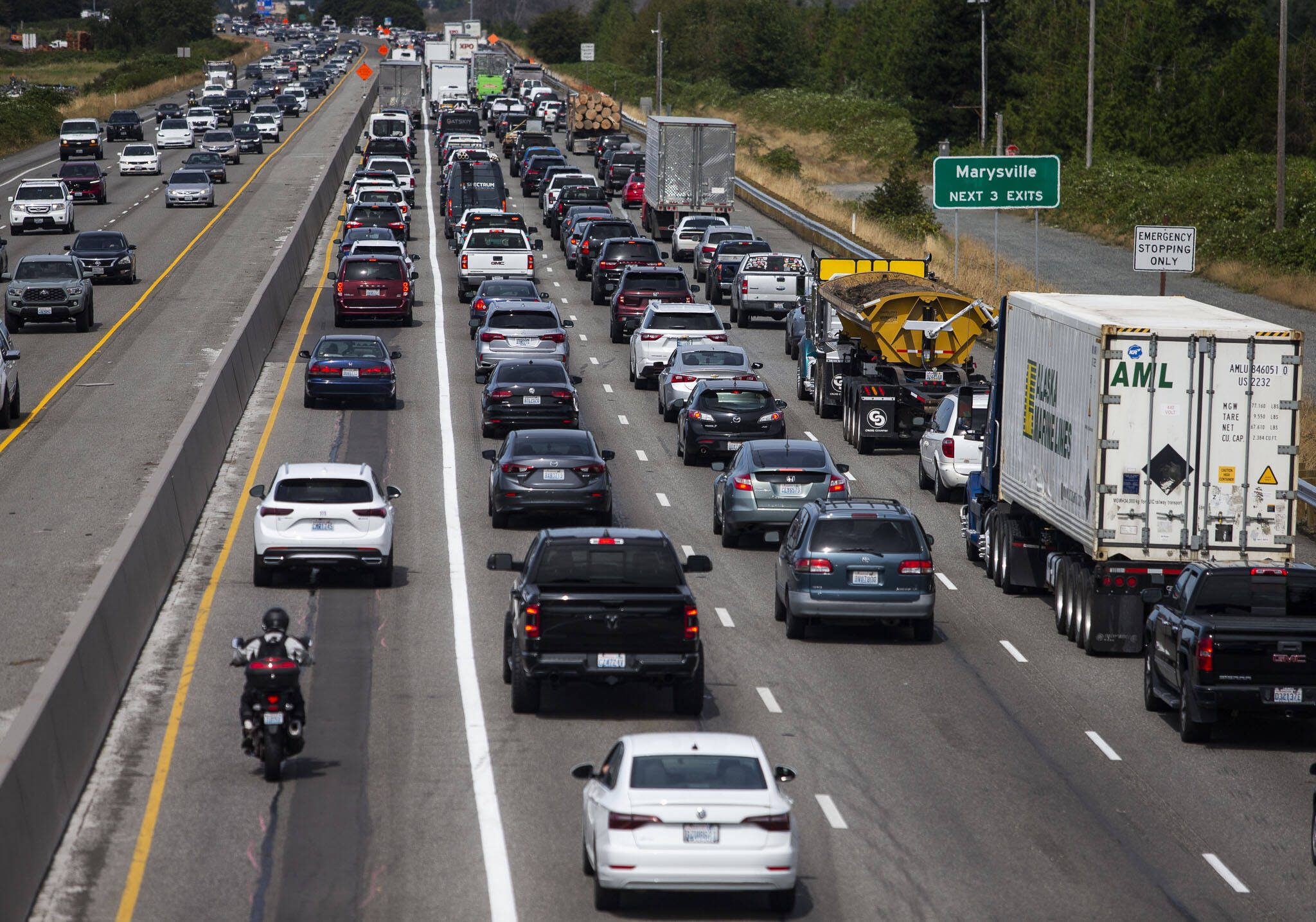 Traffic moves northbound in a new HOV lane on I-5 between Everett and Marysville on Monday, Aug. 19, 2024 in Everett, Washington. (Olivia Vanni / The Herald)