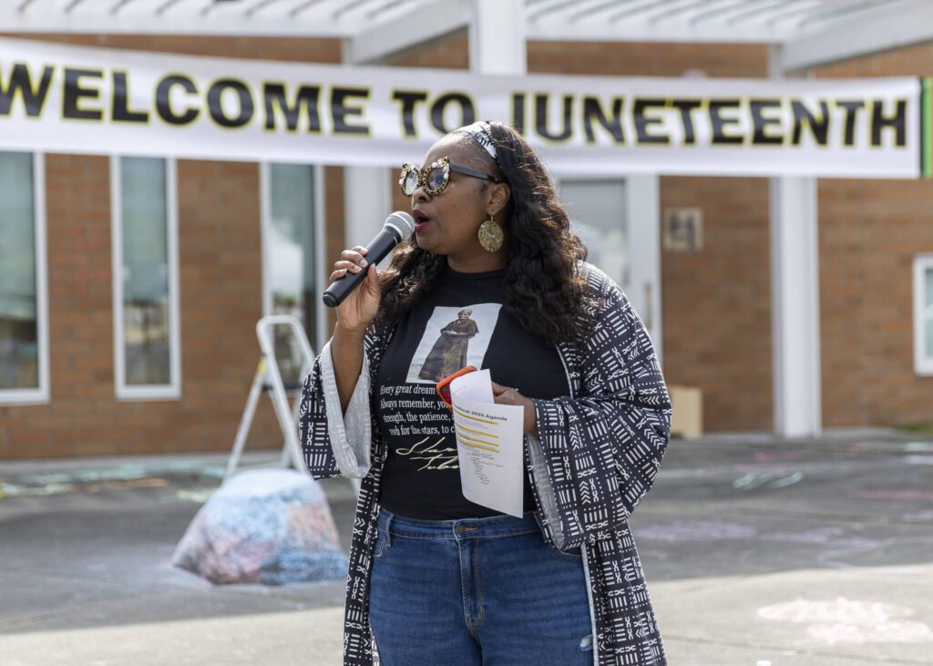 DanVonique Reed speaks during Lynnwood Juneteenth on Thursday, June 19, 2025 in Lynnwood, Washington. (Olivia Vanni / The Herald)
