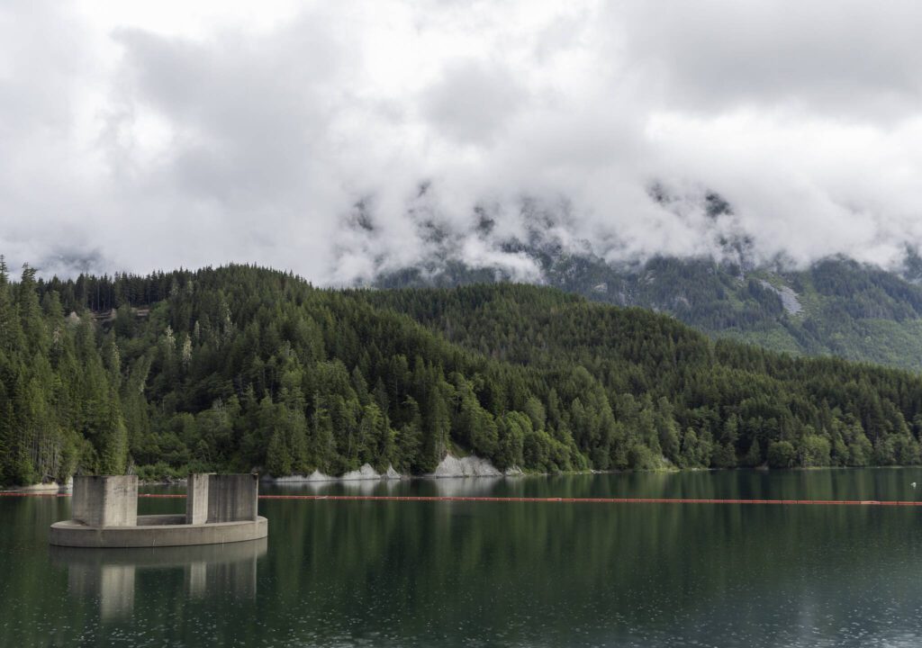 A rain cloud rolls in above Spada Lake on Wednesday, June 18, 2025 in Granite Falls, Washington. (Olivia Vanni / The Herald)
